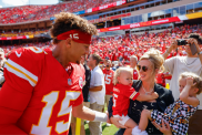 Patrick Mahomes #15 of the Kansas City Chiefs greets his wife, Brittany Mahomes and their two children Patrick Bronze Lavon Mahomes and Sterling Skye Mahomes prior to the game against the Cincinnati Bengals at GEHA Field at Arrowhead Stadium on September 15, 2024 in Kansas City, Missouri.