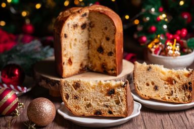 Traditional Italian Christmas cake Panettone with festive decorations