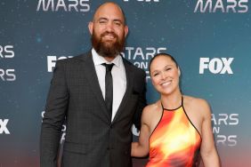 Travis Browne and Ronda Rousey attend FOX's Stars On Mars "The Mars Bar" VIP red carpet press preview at Scum and Villainy Cantina on June 01, 2023 in Hollywood, California.