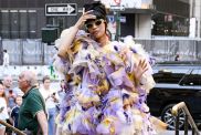 Cardi B is seen wearing a Marc Jacobs sheer ruffled outfit, yellow leggings outside the Marc Jacobs show on July 01, 2024 in New York City.