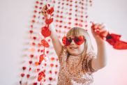 Happy little girl enjoying Valentine's day