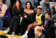 Kim Kardashian and Saint West attend a basketball game between the Los Angeles Lakers and the Phoenix Suns at Crypto.com Arena on December 05, 2023 in Los Angeles, California.