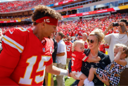 Patrick Mahomes #15 of the Kansas City Chiefs greets his wife, Brittany Mahomes and their two children Patrick Bronze Lavon Mahomes and Sterling Skye Mahomes prior to the game against the Cincinnati Bengals at GEHA Field at Arrowhead Stadium on September 15, 2024 in Kansas City, Missouri.