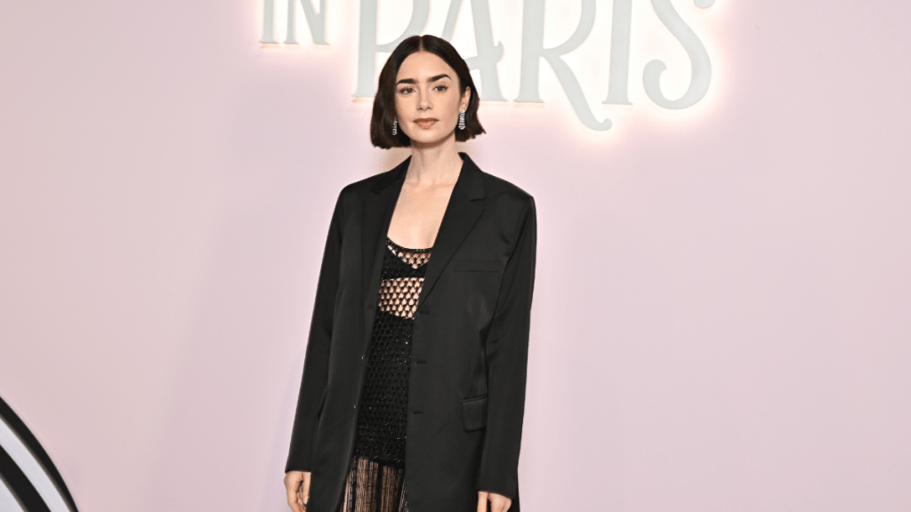 Lily Collins attends the "Emily In Paris" Netflix Photocall at La Samaritaine on September 12, 2024 in Paris, France.