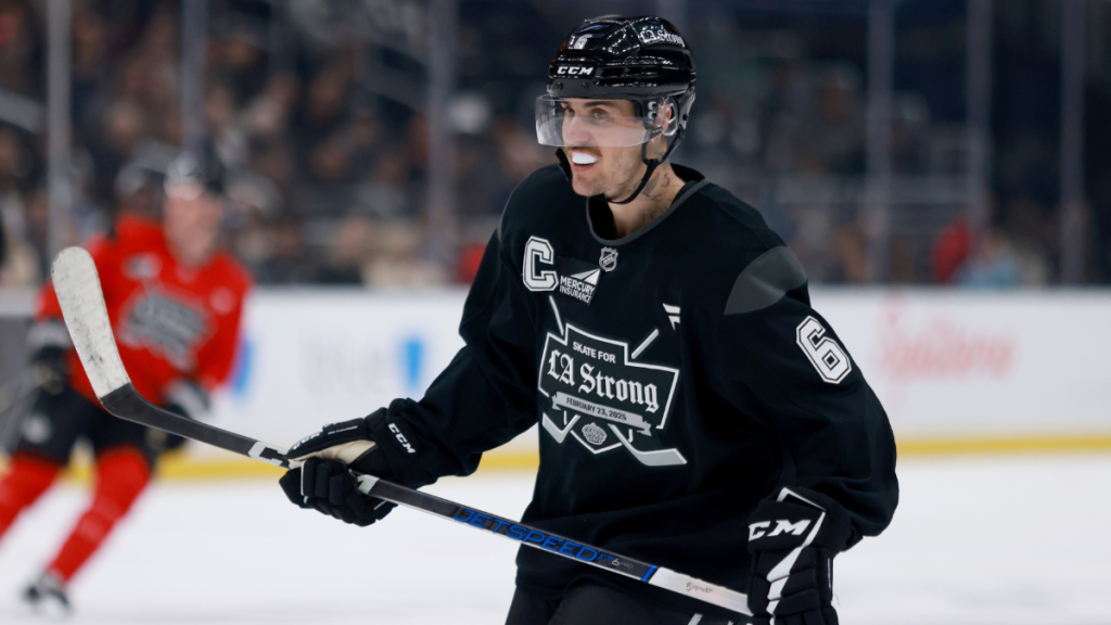 Justin Bieber #6 of Team Black tracks the puck against Team Red during NHL & Los Angeles Kings Present "Skate For LA Strong" at Crypto.com Arena on February 23, 2025 in Los Angeles, California.