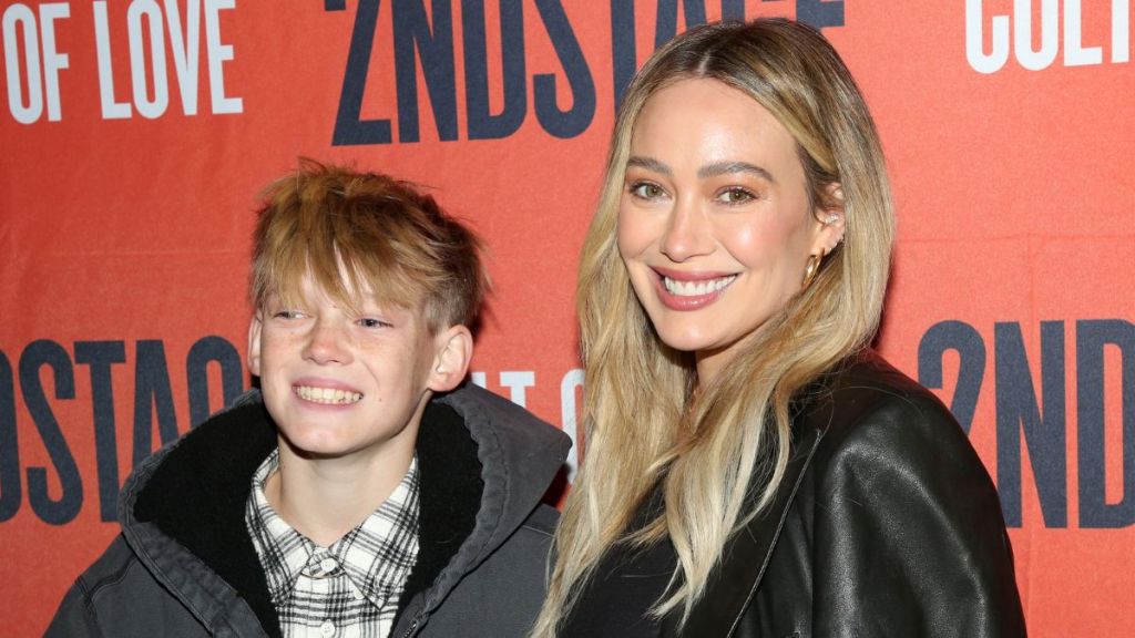 Luca Comrie and Hilary Duff pose at the opening night of Second Stage Theatre's new play "The Cult of Love" on Broadway at The Hayes Theater on December 12, 2024 in New York City.